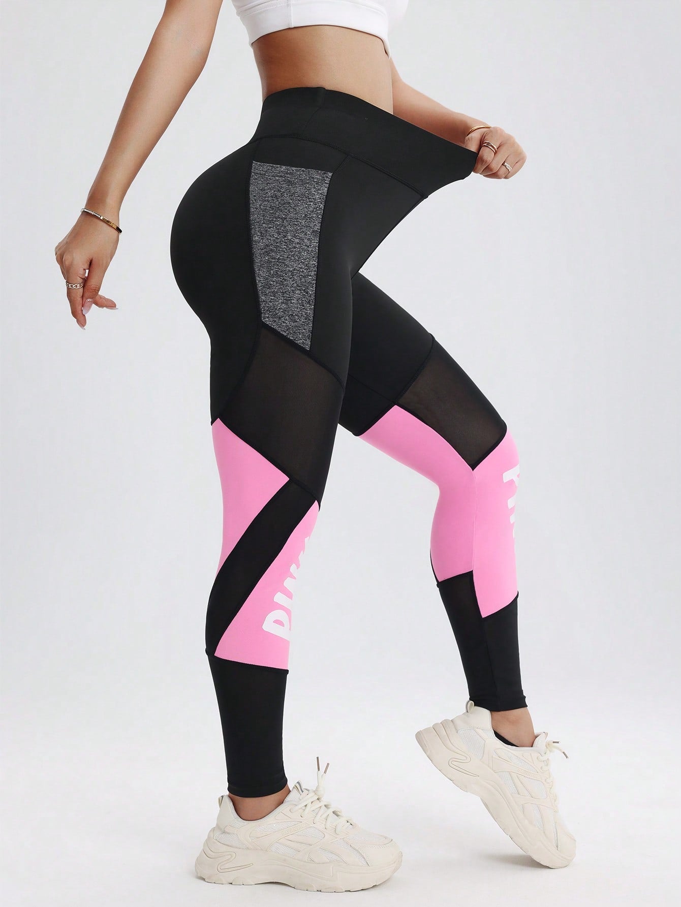 Legging Cintura Alta Com Recortes Gráficos