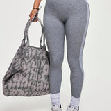 Legging Fitness Mesclada Com Faixa Lateral Integrada